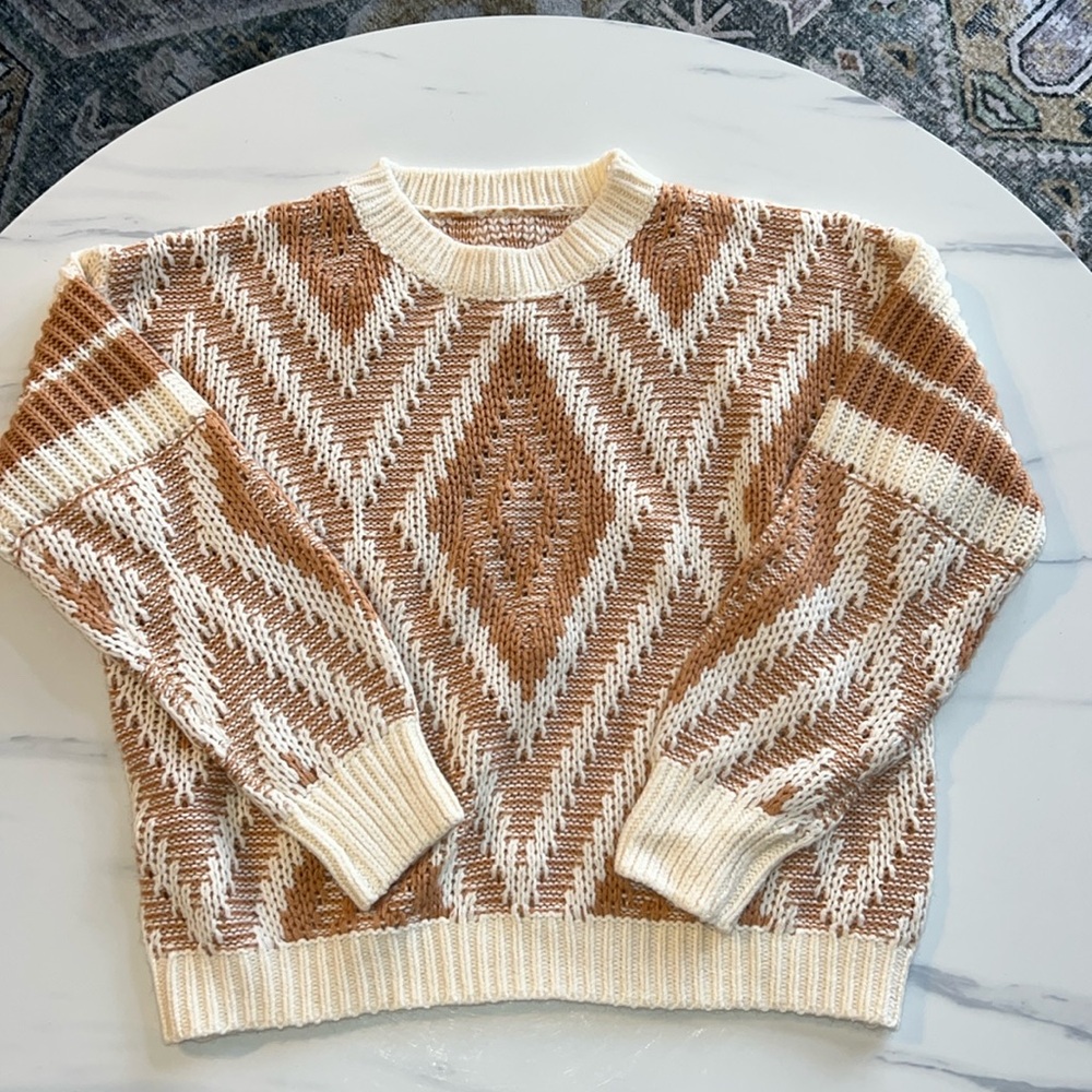Soft burnt orange sweater.